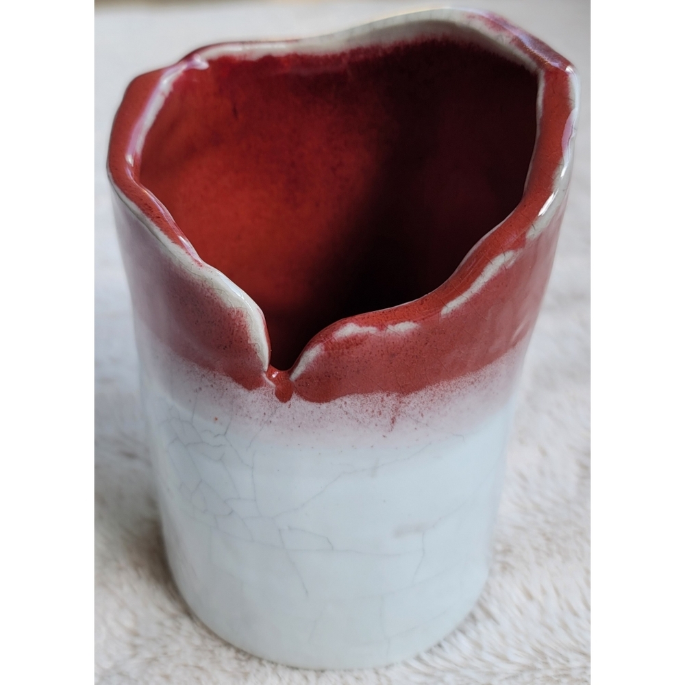 Red and white handmade pottery piece